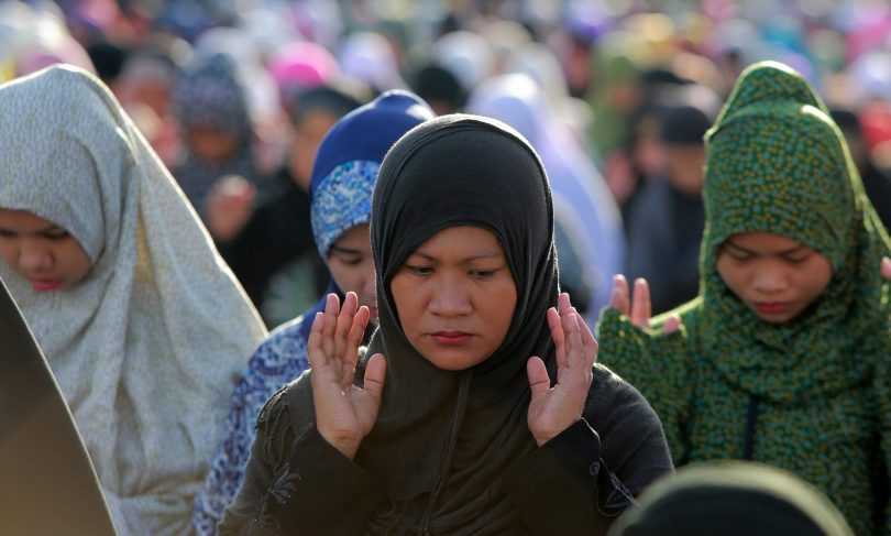 Muslims pray during the Eid al-Adha celebration in Taguig City, the Philippines.