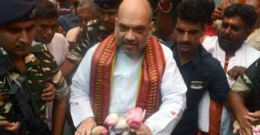 Amit Shah has lunch at BJP worker’s house, interacts with family